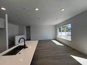 Kitchen featuring sink and hardwood / wood-style floors