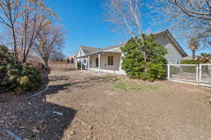 Rear view of property featuring a patio