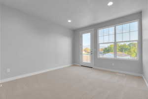 View of carpeted spare room