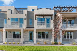 Townhome / multi-family property featuring a balcony