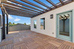 Wooden deck with a pergola