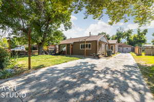 Ranch-style home with a front yard