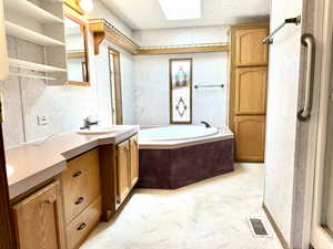 Master bathroom with shower & garden tub