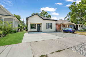 View of front of home featuring a front lawn