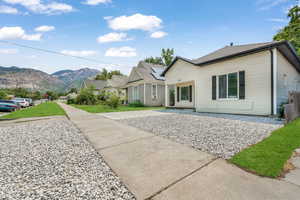 View of front of property with a mountain view