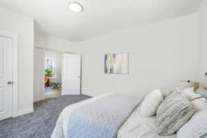 Bedroom with carpet flooring