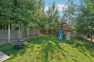 View of yard with a playground