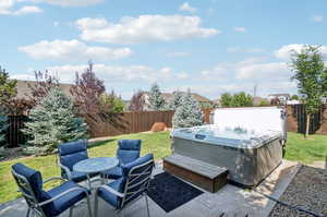 View of patio / terrace featuring a hot tub