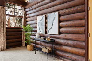 Exterior space featuring rustic walls