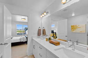 Bathroom featuring double vanity