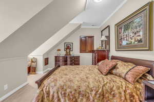 Bedroom with crown molding and light wood-type flooring