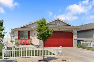 Single story home with a garage