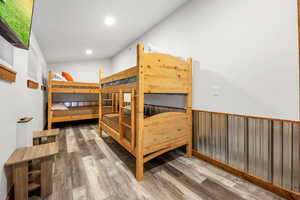 Bedroom with wood-type flooring