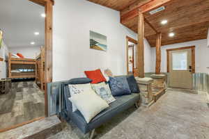 Living area featuring hardwood / wood-style floors and wood ceiling