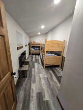 Bedroom featuring dark wood-type flooring