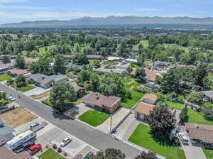 Birds eye view of property with a mountain view