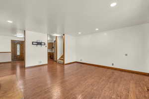 Unfurnished living room with hardwood / wood-style floors