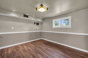 Unfurnished room with wood-type flooring