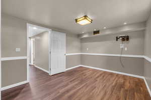 Spare room with wood-type flooring