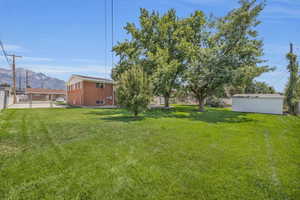 View of yard with a mountain view