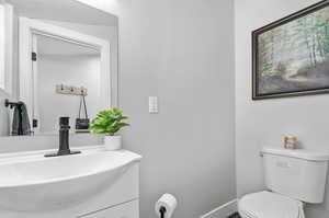 Bathroom with vanity and toilet