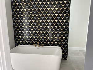 Bathroom featuring tile patterned floors