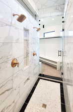 Bathroom featuring a shower with shower door