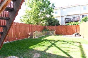 View of yard with a deck