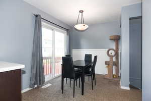 View of carpeted dining area