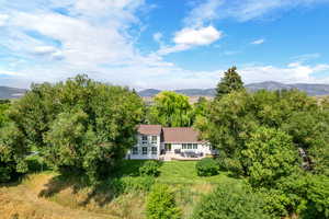 Aerial view featuring a mountain view