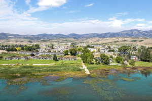 Bird's eye view featuring a water and mountain view