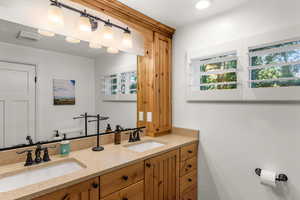 Bathroom with dual bowl vanity