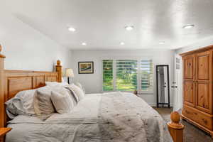 Bedroom with carpet flooring