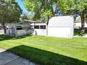 View of yard featuring an outbuildings