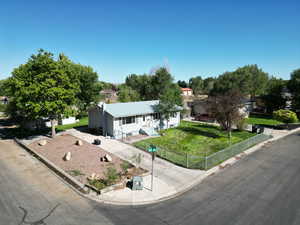 Ranch-style house with a front lawn