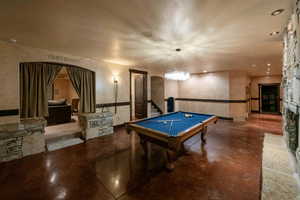 Entry to home theater in family room. Stained concrete floors.