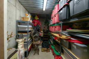 One of two large storage rooms in lower level.