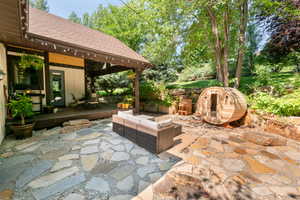 Wellness patio featuring brand new cold/hot water plunge and sauna. Included