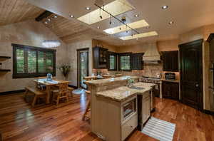 Bar seating in kitchen. Wood shutters throughout home.