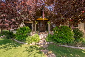 Front door with mature landscaping