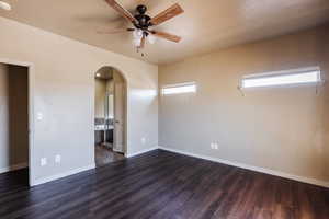 Spare room featuring hardwood / wood-style flooring and ceiling fan