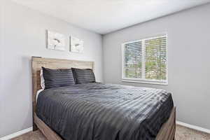 View of carpeted bedroom