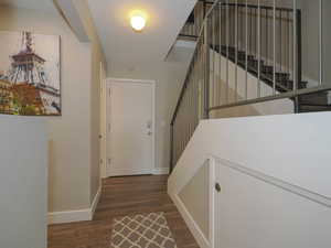 Interior space featuring dark hardwood / wood-style floors