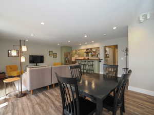 Dining space featuring hardwood / wood-style flooring