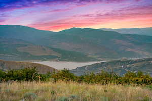 View of mountain feature featuring a water view