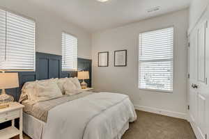 View of carpeted bedroom