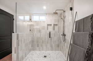 Bathroom featuring walk in shower