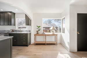 Interior space with dishwasher and light wood-type flooring