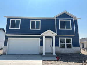 Front facade featuring a garage