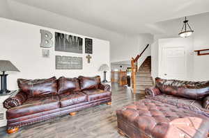 Living room featuring hardwood / wood-style flooring